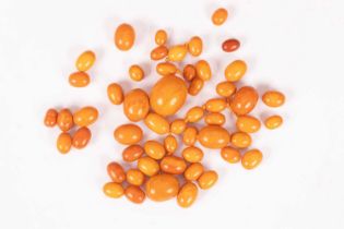 A quantity of loose Baltic oval amber beads