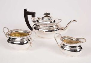 A three-piece silver tea set