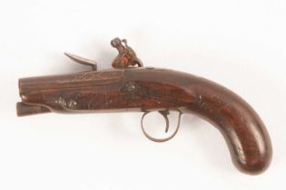 A flint lock pistol with walnut stock