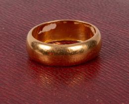 A 22ct yellow gold wedding band