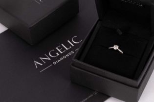 An 18K white gold diamond solitaire ring