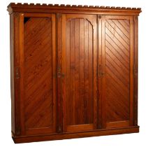 An Aesthetic movement pitch pine triple wardrobe,