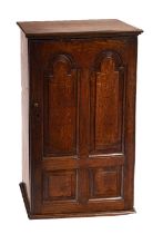 An early 18th Century oak wall hanging cupboard