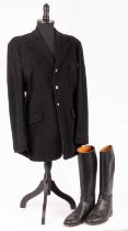 A mens black woollen riding jacket