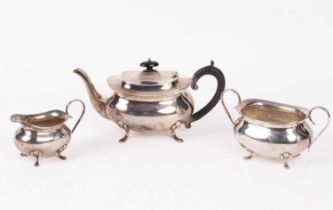 A three piece silver tea set,