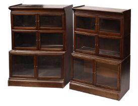 A pair of oak sectional bookcases