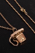 A 9ct gold telephone charm