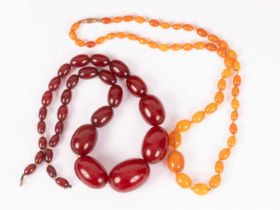 A yellow amber necklace of graduated oval beads