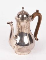 A silver coffee pot