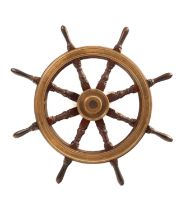 A brass mounted ship's wheel