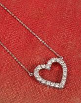 A diamond-set heart-shaped pendant