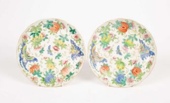 A pair of Chinese famille rose plates