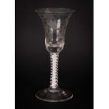 An English 18th Century engraved opaque twist wine glass