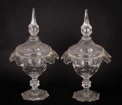 A pair of cut glass bonbon dishes and covers