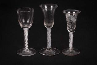 Three Dutch 18th Century opaque twist stemmed wine glasses