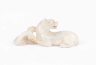 A Chinese jade carving of a leopard and cub