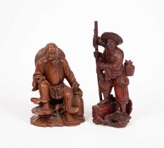 Two Chinese wooden carvings of fishermen