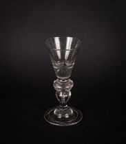 An English heavy baluster wine glass