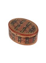 A George III tortoiseshell, red lacquer and inlaid two-coloured gold oval snuff box
