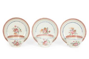 A set of three Chinese famille rose tea bowls and saucers