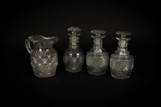 A pair of Georgian cut glass decanters