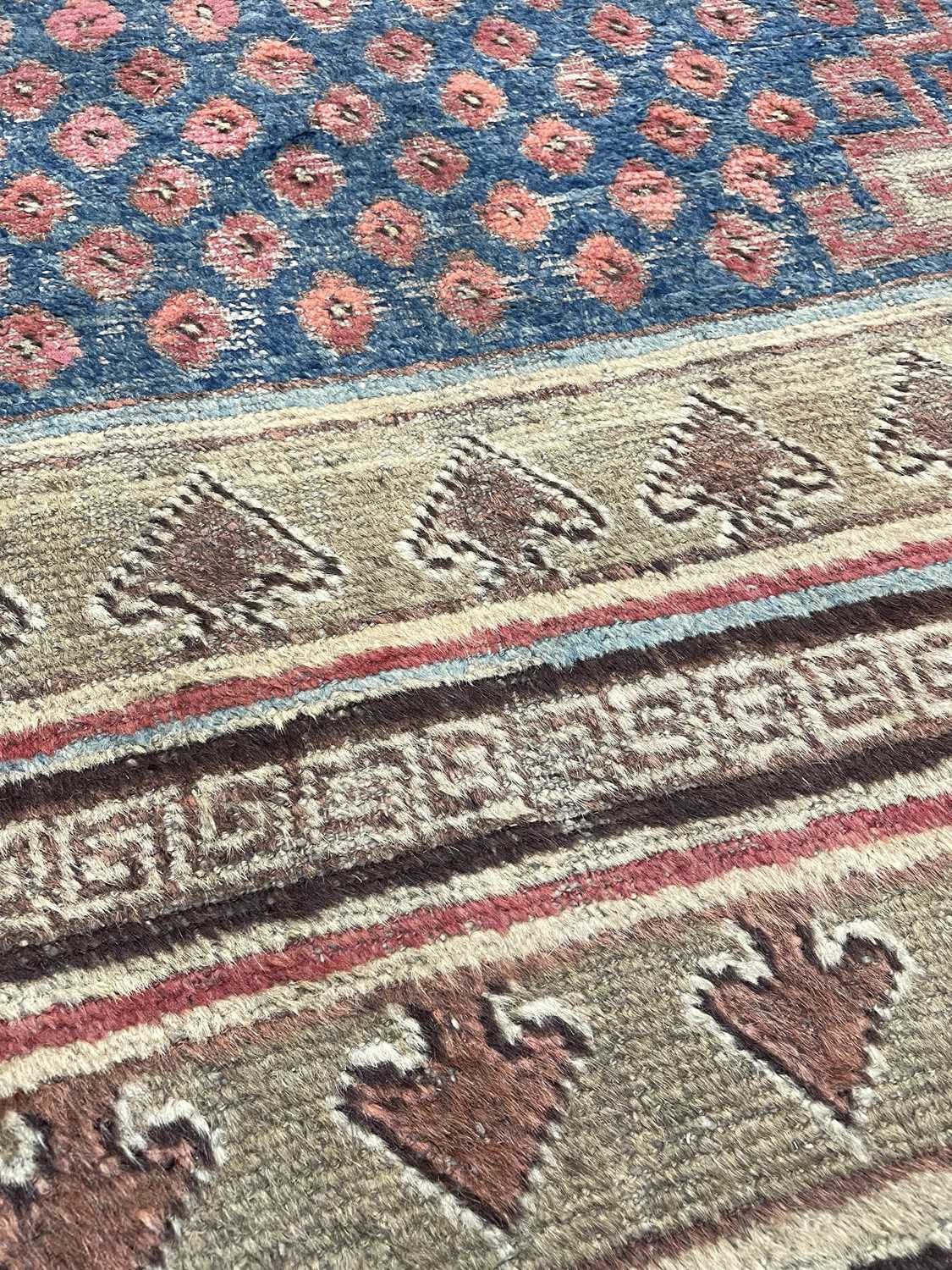 A Khotan long rug - Image 28 of 37