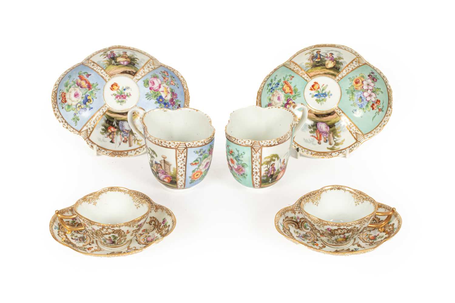 Two pairs of Meissen (outside decorated) quatrefoil cups and saucers