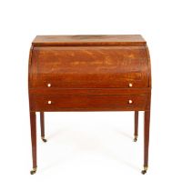 A late George III figured mahogany and rosewood crossbanded cylinder desk