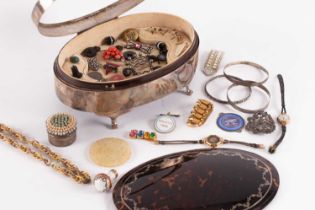 A silver mounted tortoiseshell dressing table box