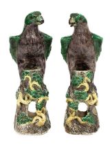 A pair of Chinese stoneware figures of hawks