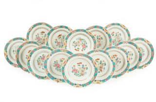 A set of fourteen Chinese famille rose plates