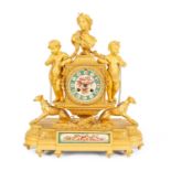 A French ormolu and Sèvres style porcelain mantel clock