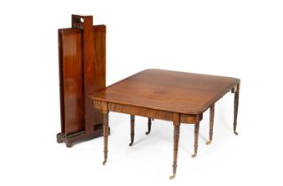 A Regency patent extending mahogany dining table