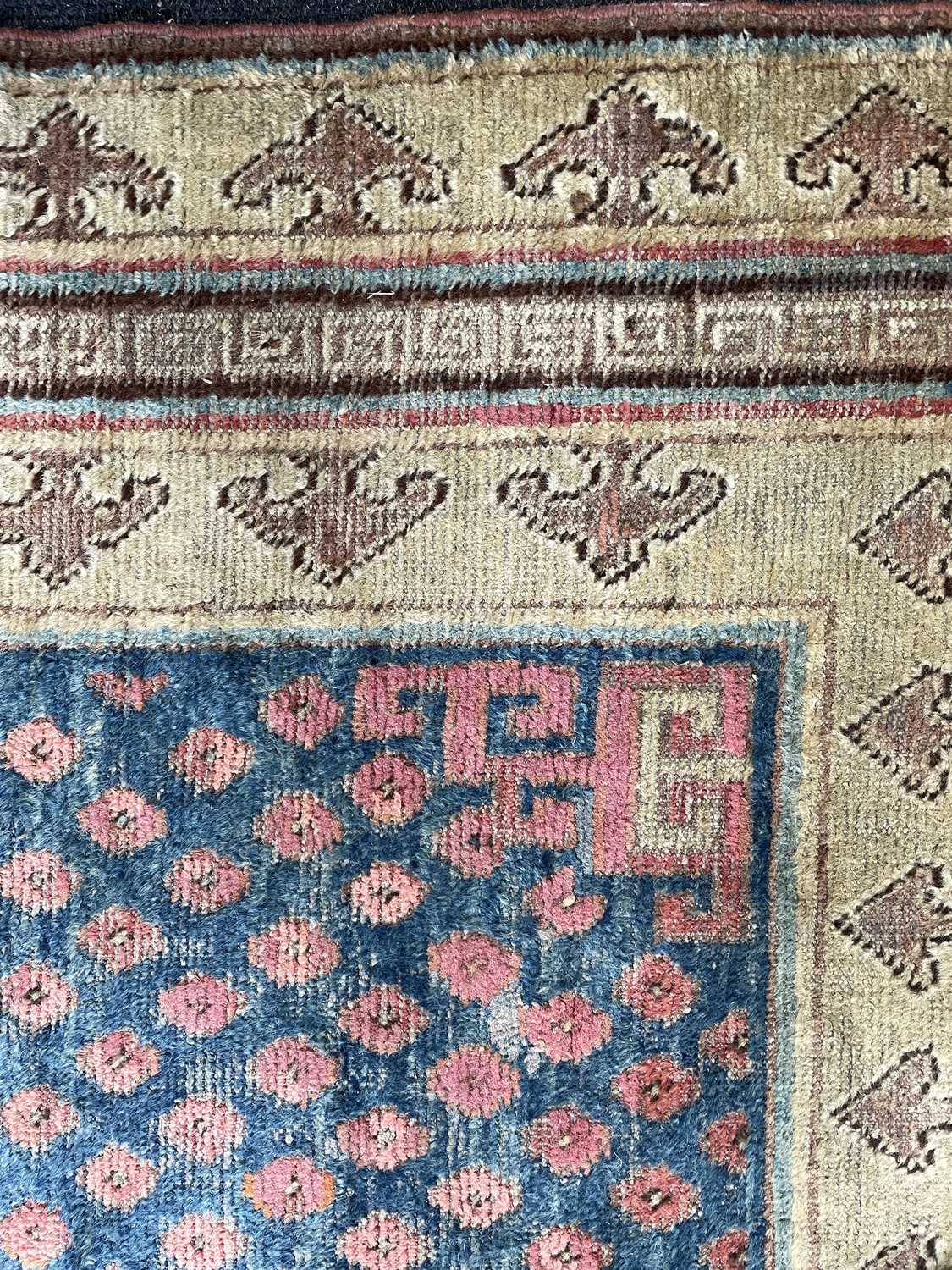 A Khotan long rug - Image 22 of 37