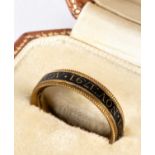 A George III gold and black enamel mourning ring