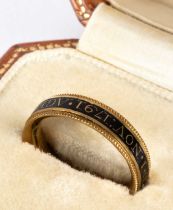 A George III gold and black enamel mourning ring