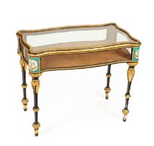 A Napoleon III ebonised and gilt composition vitrine table