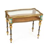 A Napoleon III ebonised and gilt composition vitrine table