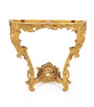 A George II giltwood serpentine console table
