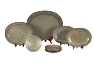 A set of six pewter plates