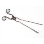 A pair of George III silver scissor action asparagus tongs