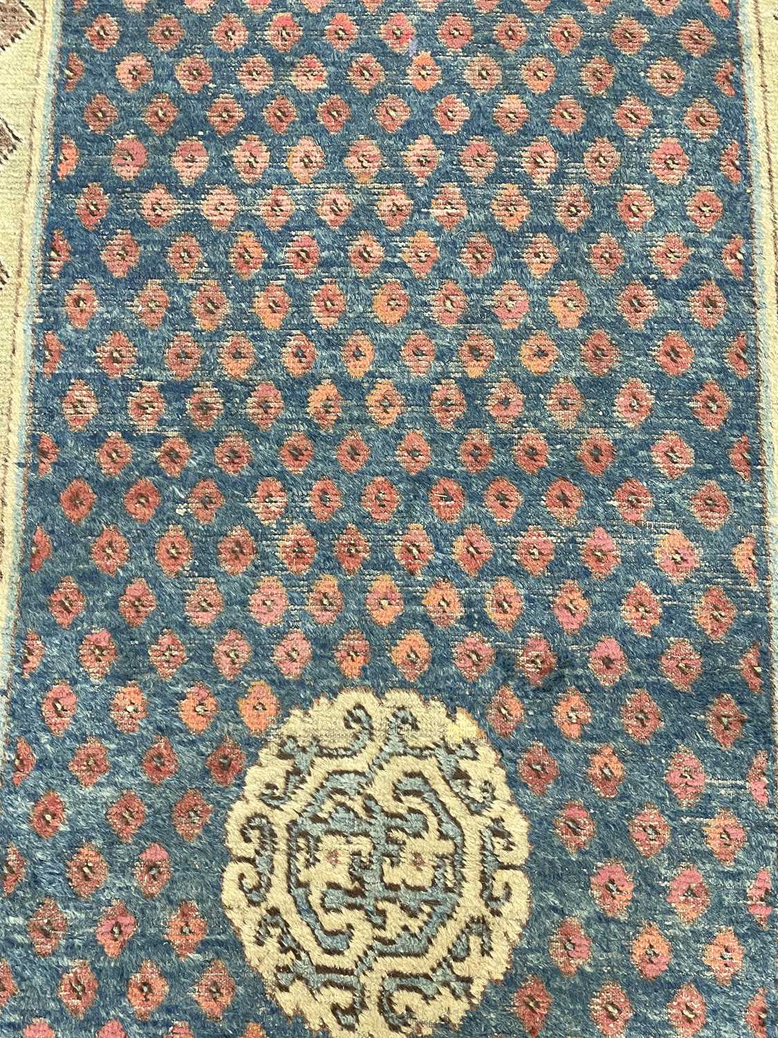 A Khotan long rug - Image 24 of 37