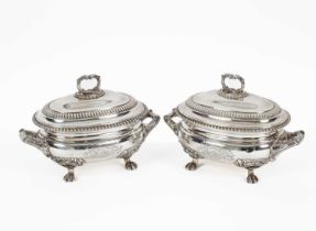 A pair of George III two-handled silver sauce tureens and covers