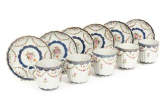 A set of five Chinese famille rose teacups and six saucers