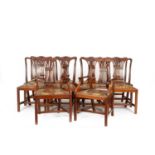 A set of ten George III style mahogany dining chairs