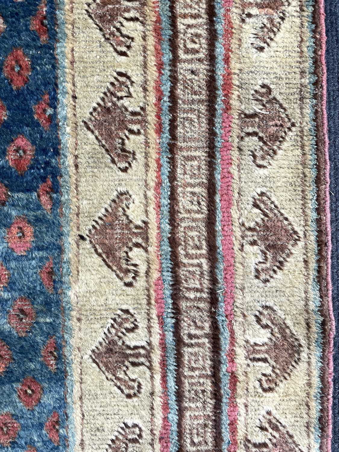 A Khotan long rug - Image 23 of 37