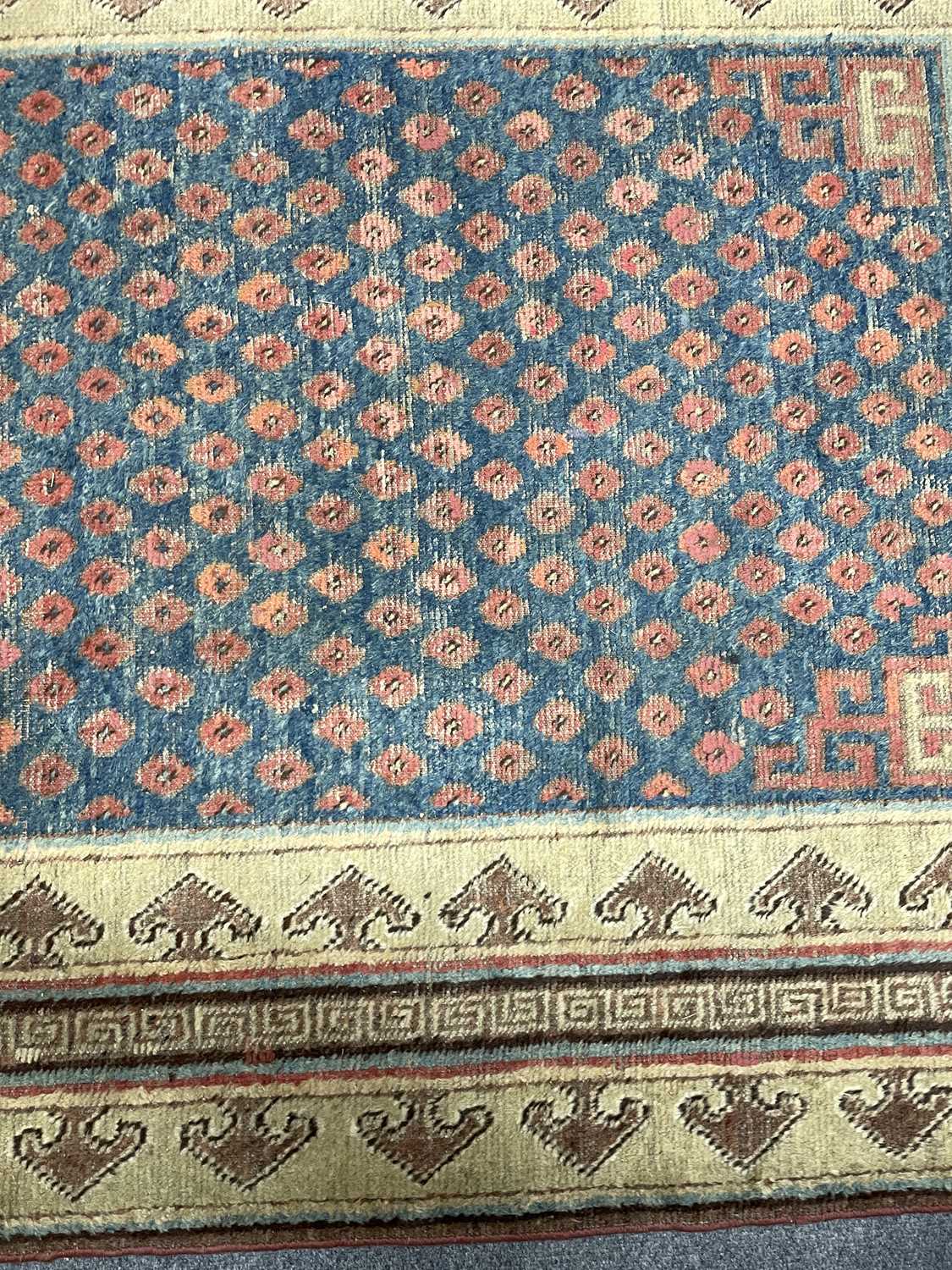 A Khotan long rug - Image 36 of 37