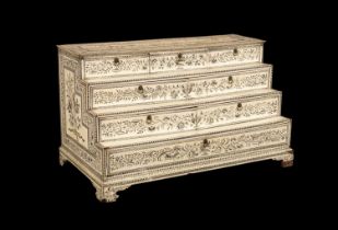 An Anglo-Indian engraved ivory stepped four tier dressing stand