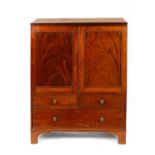 A Regency mahogany linen press of small proportions