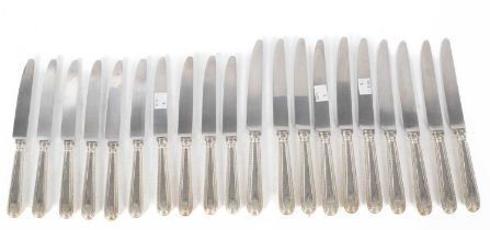 A set of ten silver handled table knives